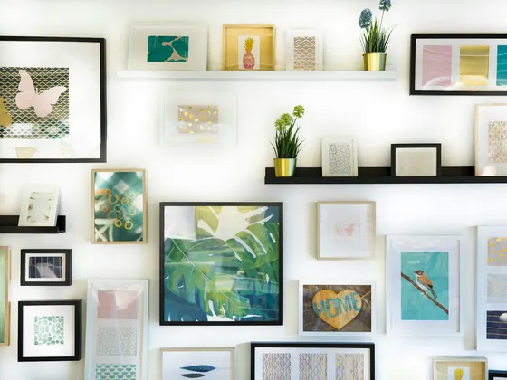Framed wall art above a side table